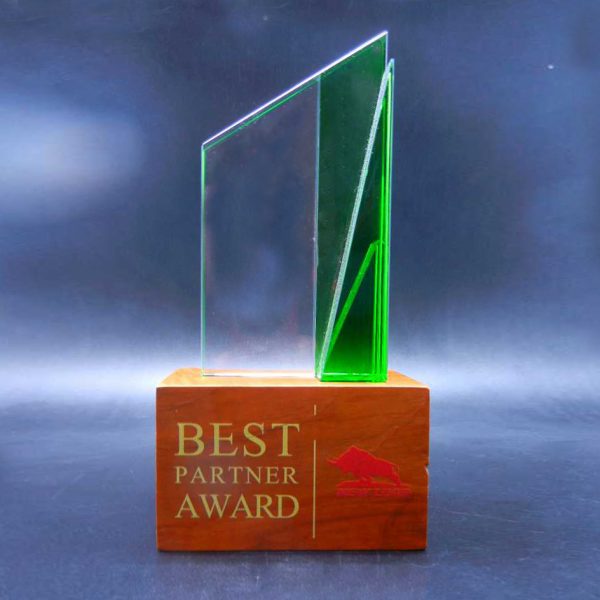 Trapezium glass trophy on hardwood base